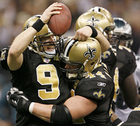 Saints QB Drew Brees celebrates victory.